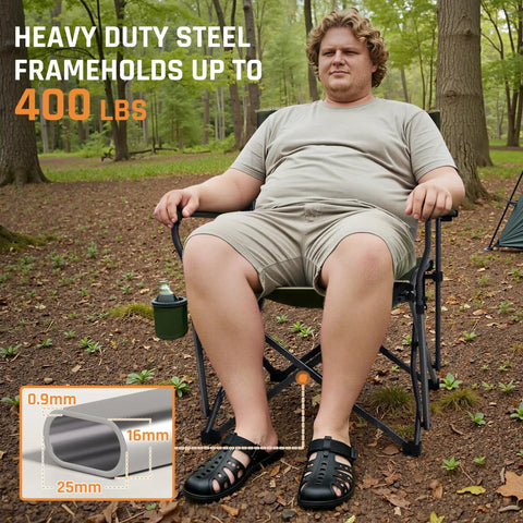 Man sitting on Big And Tall 400 Pound Heavy Duty Folding Camp Chair With Solid Metal Armrests And Swivel Cup Holder in forest