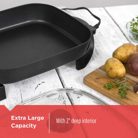 Electric Skillet With Variable Temperature Control And Nonstick Cooking Surface next to vegetables on a wooden board