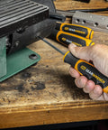 10 Piece Phillips Slotted Pozidriv Screwdriver Set With Dual Material Handles And Speed Zone Grip Non Slip Black Oxide Tips For Fast Comfortable Precision In Home And Shop Repairs being used on machinery