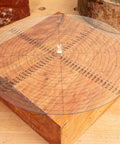 Clear acrylic 10-inch round center finder compass with black measurement markings for drawing circles.