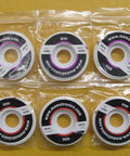 Desoldering Braid With Flux Copper Solder Wick 10 Spools Each 1.5m Long Total 15m Includes Five Spools At 2mm Wide And Five Spools At 2.5mm Wide Ideal For Electronics SMT Rework And DIY Projects in packaging on yellow surface