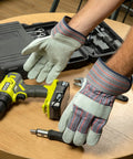 Cowhide Leather Work Gloves With Suede Finish Palm And Rubberized Safety Cuff in workshop with tools