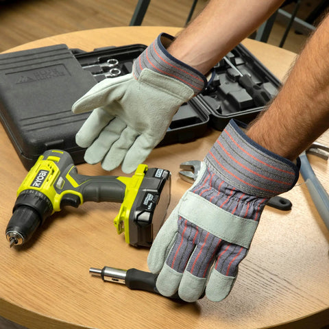 Cowhide Leather Work Gloves With Suede Finish Palm And Rubberized Safety Cuff in workshop with tools
