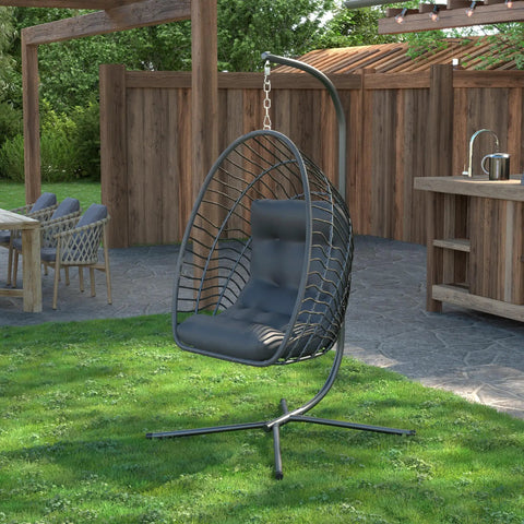 Egg Chair With Stand For Indoor Outdoor Use, Foldable Rattan Wicker Hanging Swing in a garden setting