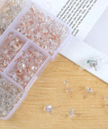 235 Piece Push Pin And Thumb Tack Assortment Kit With Clear Clips Rose Gold Hooks and Map Markers, showing clear and rose gold pins.