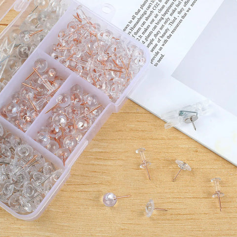 235 Piece Push Pin And Thumb Tack Assortment Kit With Clear Clips Rose Gold Hooks and Map Markers, showing clear and rose gold pins.