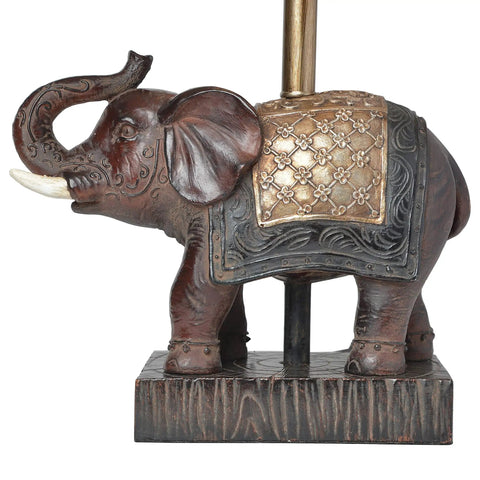 Festive Elephant Table Lamp In Brown With Gold Accent Resin Base And Brown Fabric Shade, detailed elephant design close-up