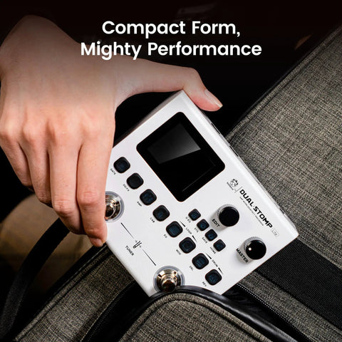Hand holding Dual Stomp Lite Multi Effects Guitar Pedal With 125 Effects, 99 Presets, 10 Effect Modules, compact design