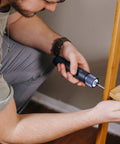 Person using MI HOTO Cordless Power Electric Screwdriver With LED Shadow Light to assemble wooden furniture
