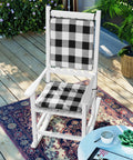 Comfy Porch Rocking Chair Cushions Set For Indoor And Outdoor Use With Secure Ties Easy To Clean 20 By 17 By 2 Inches Jurby Black White Assembled In The USA on a white rocking chair on a wooden deck.