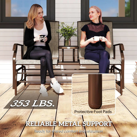 Two women sitting on an Outdoor Glider Bench With Center Table Metal Frame Patio Loveseat With Breathable Mesh Fabric And Armrests