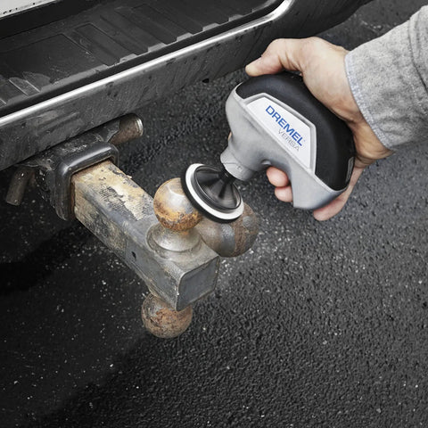 Using 16 Piece Versa Power Scrubber Accessory Value Kit With 15 Cleaning Pads on a metal hitch for rust removal