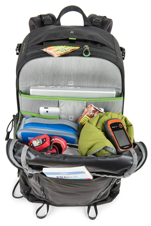 Open view of BackLight 36L Outdoor Adventure Camera Daypack Backpack In Woodland Green, showing fast access pockets filled with gear