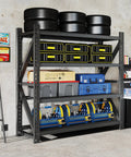 Heavy Duty Steel Shelving Rack With 4 Adjustable Bays Holding 4000 Pounds Capacity Built Like A Tank For Rugged Garage And Workshop Storage Solutions Measuring 69 By 71 By 23 Inches with tools and tires.