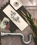 All In One Traditional Bathroom Sink Trim Kit With P Trap Polished Chrome Finish Solid Brass Construction laid out on tiles