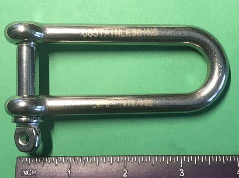 Long D Shackle 316 Stainless Steel Marine Grade Three Eighths Inch Heavy Duty Boat Hardware placed next to a ruler
