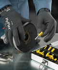 Person wearing Cut Resistant Work Gloves With Ultra Dexterity And All-Day Comfort, ZONZ Knit For Flexible Movement, handling tools.