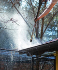 Person using Rotating Turbo Nozzle For Pressure Washers 4000 PSI With Stainless Steel Filter And One Quarter Inch Quick Connect