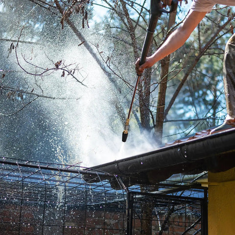 Person using Rotating Turbo Nozzle For Pressure Washers 4000 PSI With Stainless Steel Filter And One Quarter Inch Quick Connect