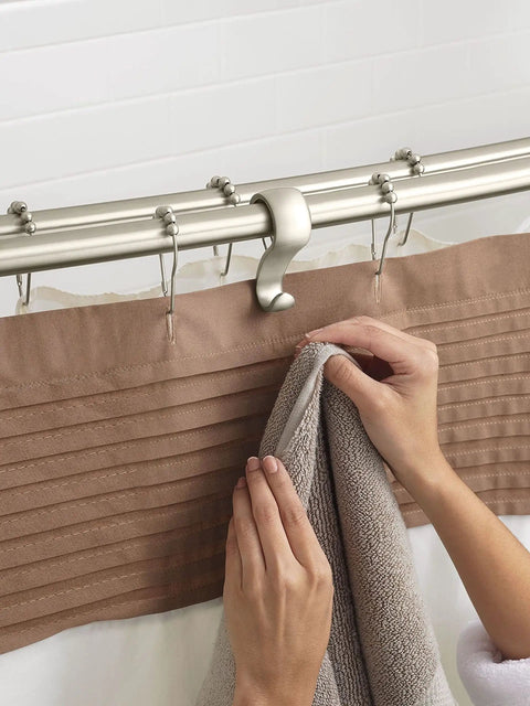 Brushed Nickel Adjustable 57 To 60 Inch Stainless Steel Double Curved Shower Curtain Rod With Wall Fixed Brackets, hand holding towel