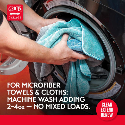 Person using Pro Grade Car Care Microfiber And Foam Pad Cleaner For Polish Wax And Sealant Residue Removal Revives Soft Towels And Absorbent Pads Deep Clean For Peak Shine Results 35 Oz in washing machine with microfiber towels.