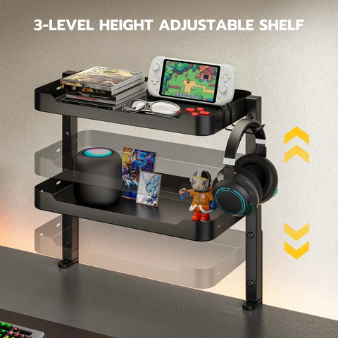 2 Tier Clamp On Desk Shelf 16 Inch Wide Adjustable Above Or Under Desk Storage Holds 66 Lbs Heavy Duty Desktop Organizer in black with gaming accessories and a headphone holder.