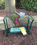 Folding Kneeler Garden Bench And Seat For Yard Work, sturdy arms for easy standing, foam padding, green metal frame in garden