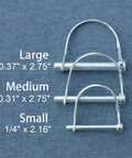 Beefy Heavy Duty Trailer Coupler Pin Pack Of 4 Zinc Plated Carbon Steel Hitch Pin Safety Locking Pins One Quarter Inch By Two Point Sixteen Inches Rust Resistant And Ready For Real World Towing in small size shown with large and medium size pins on blue fabric background