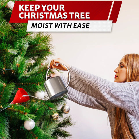 Person watering a Christmas tree using a red funnel and metal watering can