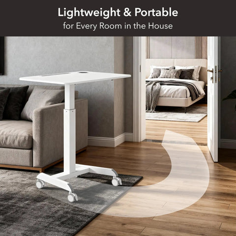 Portable Laptop Cart On Wheels With Adjustable Height Sit Stand Desk And A 28.5 By 22 Inch Tabletop In White in a modern living room