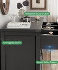 Slap Some Order On Your Room With This 63 Inch Wide Nine Drawer Bedroom Dresser Boasting Deep Storage Heavy Duty Handles Sleek Black Finish Modern TV Stand For Killer Organization, showing anti-tipping device and smooth sliding drawers.