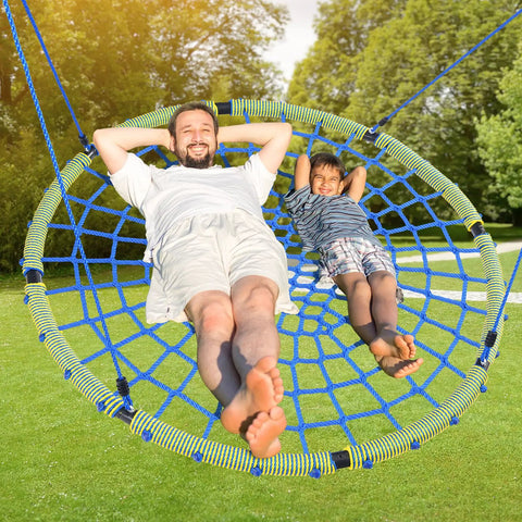 Man and child relaxing on 60 Inch Spider Web Saucer Tree Swing for Kids and Adults Heavy Duty Outdoor Net Swing With Steel Frame