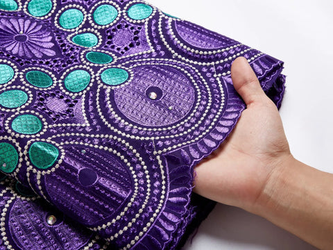 African Lace Fabric 5 Yards Jacquard Guipure Embroidery Floral Lace for Party Dress with hand showing purple and teal details