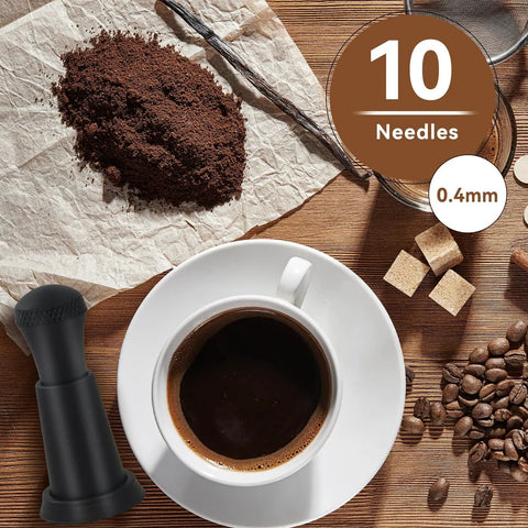 Espresso Distribution Tool With 0.4mm 10 Needle Stirrer next to coffee cup and grounds