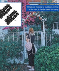 Tough As Nails Heavy Duty Black Stainless Steel Gate Hinges For Wood Fences And Patio Doors Two Pack displayed on a garden gate.