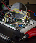 Adjustable Soldering Helping Hand With Pro Grade Magnifying Glass Third Hand Solder Aid Wire Station Stand with circuit board.