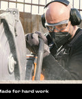 Worker using saw, wearing anti fog safety goggles for men and women with premium coating, adjustable headband, UV shield.