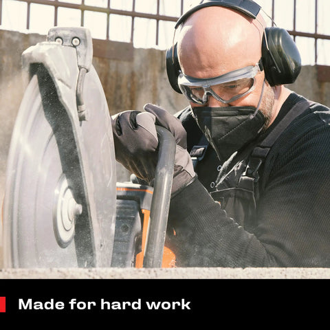 Worker using saw, wearing anti fog safety goggles for men and women with premium coating, adjustable headband, UV shield.