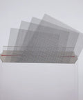 Four sheets of Rust-Resistant 304 Stainless Steel Mesh Screen For Windows And Vents overlapping, showing material texture.