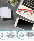 Top-down view of microfiber cleaning cloths 12-pack in white, gray, and black beside a laptop and red glasses.