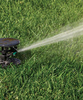 Pulse Go-To Pop-Up Impact Sprinkler Head Black 3-Inch Riser Adjustable Spray watering grass with low runoff
