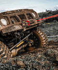 SUV using 8 Ton Off Road Winch Recovery Snatch Block Pulley Doubles Your Winch Capacity For Tough Trails, on muddy terrain