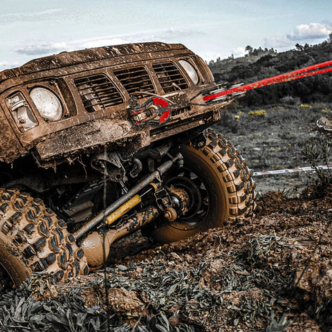 SUV using 8 Ton Off Road Winch Recovery Snatch Block Pulley Doubles Your Winch Capacity For Tough Trails, on muddy terrain