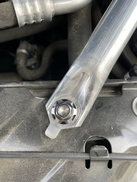 Heavy Duty Titanium Spacer Washers M6 Set of 10, 6AL 4V Grade 5 Titanium Alloy installed in vehicle assembly.