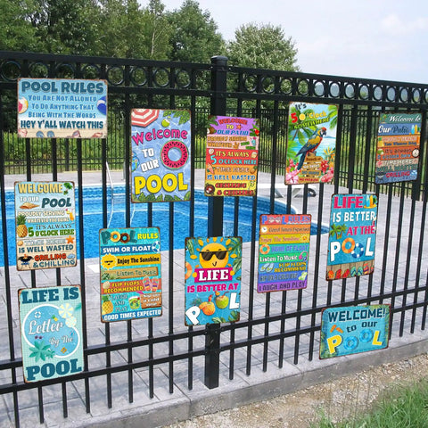 Various pool rules and welcome signs on a poolside fence, including a Pool Rules Sign Tin Decor For Beach Home Bar Deck And Backyard 8 By 12 Inch Outdoor Wall Art With Pre Drilled Holes For Easy Hanging Dope For Poolside Decor And Outdoor Spaces With Easy Mounting And Long Lasting Charm.