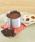 Aluminum Camping Mug With Side Handle Stove Top Safe 0.7 Quart Cup In Silver with cocoa and cookies on a placemat