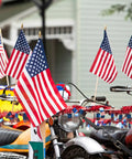 12 Pcs 8x12 Inch American Flags On Wooden Sticks 17.5 Inch Tall Outdoor Handheld Flags in patriotic parade setting