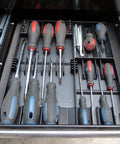 Tool Sorter Screwdriver Organizer Tray for Quick Access and Easy Grab Keep Your Screwdrivers Sorted and See Every Driver at a Glance Black Durable Plastic in use with screwdrivers neatly arranged for easy visibility in a drawer.