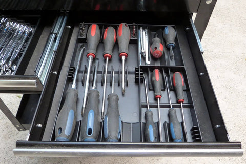 Tool Sorter Screwdriver Organizer Tray for Quick Access and Easy Grab Keep Your Screwdrivers Sorted and See Every Driver at a Glance Black Durable Plastic in use with screwdrivers neatly arranged for easy visibility in a drawer.