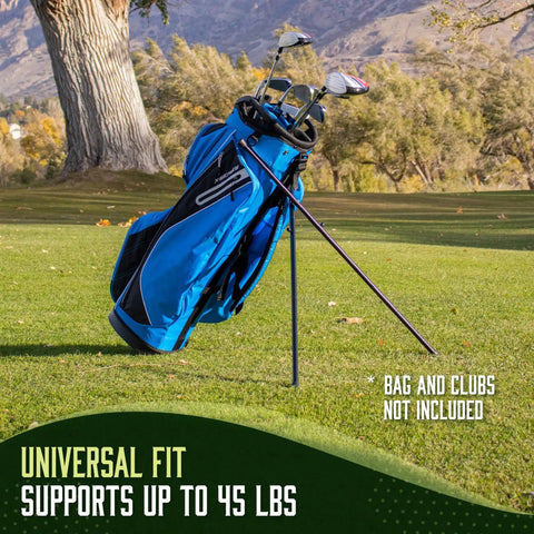 Workhorse Aluminum Golf Bag Stand Attachment With Slick Folding Legs That Anchors Your Cart Bag Firmly And Blocks Nasty Scratches While You Enjoy Smooth Playing Days Out On The Links Black holding a golf bag on green grass.